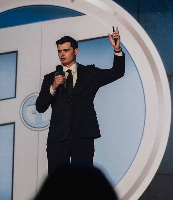 Jared Crist speaking on stage